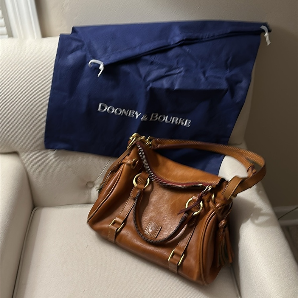 Dooney & Bourke Satchel Shoulder Handbag with adjustable strap for crossbody.